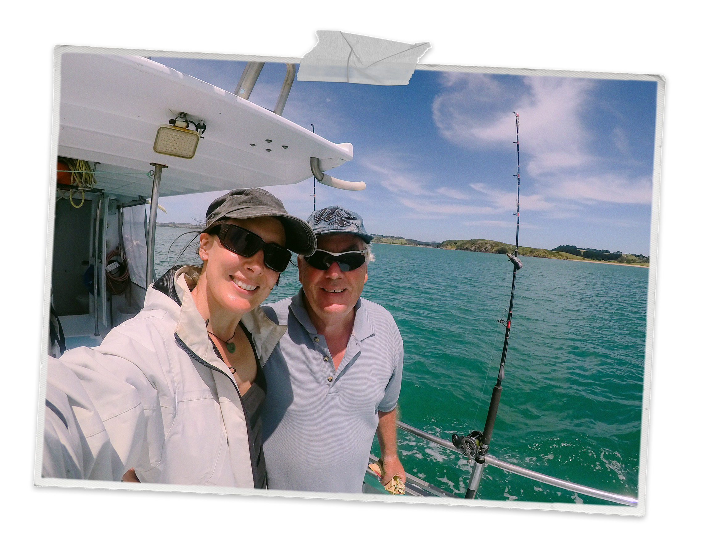 A father and daughter deep sea fishing on a boat
